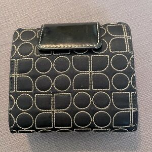 Kate Spade wallet.  Black with Beige Embroidery.  Excellent pre-owned condition.